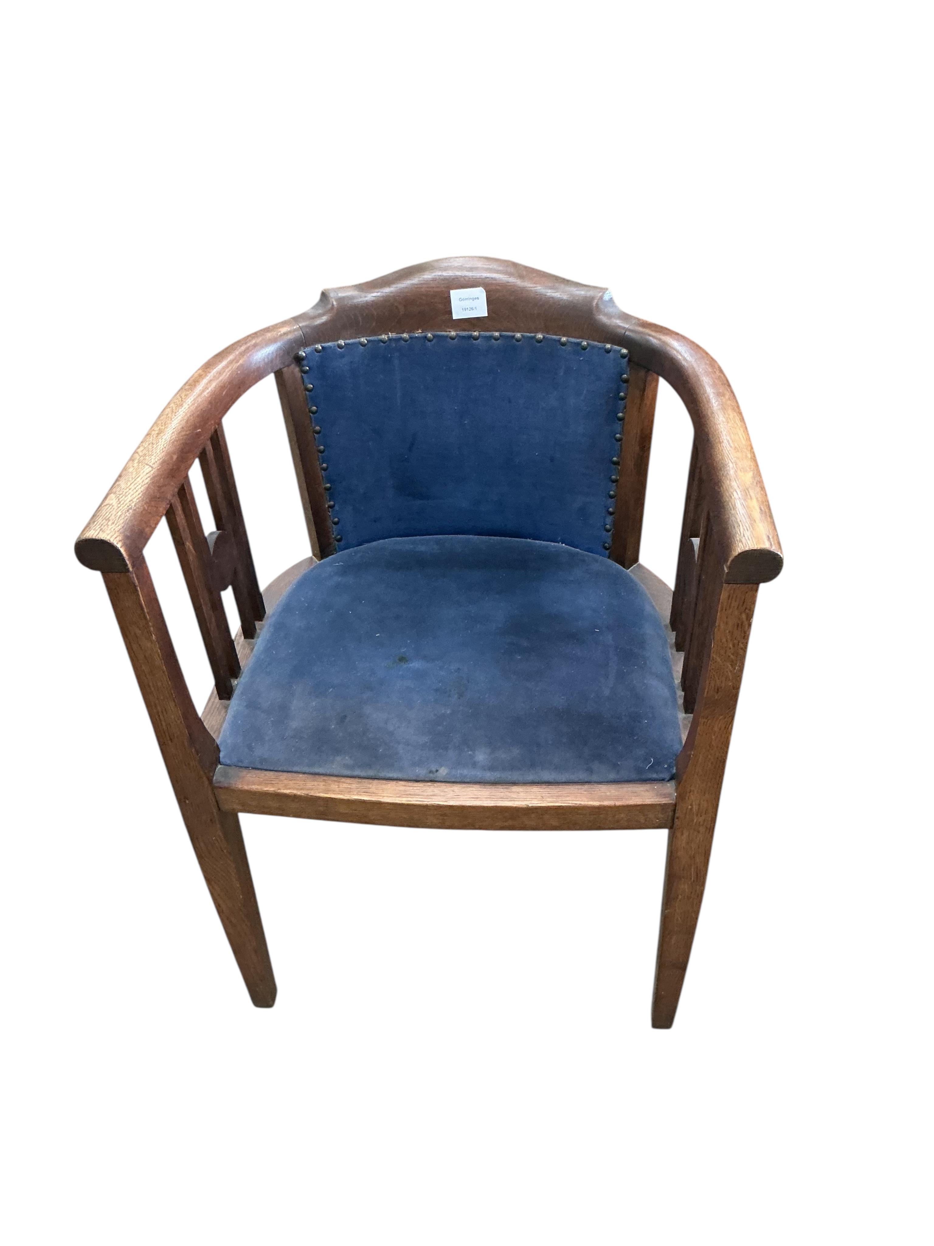 An early 20th century tub framed oak chair, width 60cm, depth 46cm, height 78cm